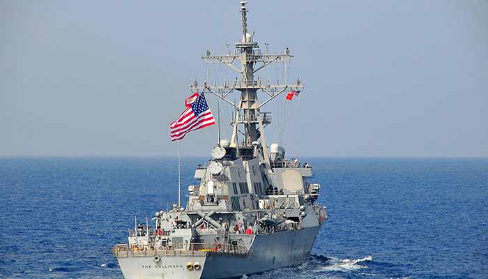 US_Navy_090213-N-4774B-039_The_guided-missile_destroyer_USS_The_Sullivans_(DDG_68)_flies_the_ship's_battle_flags_during_exercises_at_sea