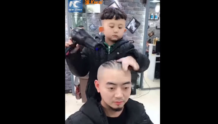 Chinese children get haircuts on traditional head-shaving day for luck |  Daily Mail Online